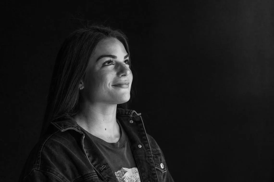 A student posing for a creative headshot.